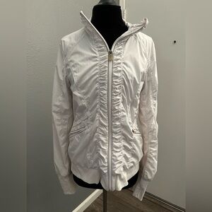 Lululemon Run Get Up And Go Jacket in a white color with ruched detailing